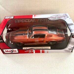 Maisto Special Edition 1967 Ford Mustang GTA Fastback die-cast model car.